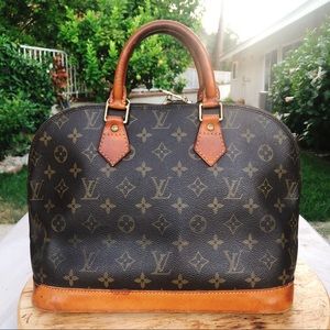 Louis Vuitton Alma monogram top handle bag
